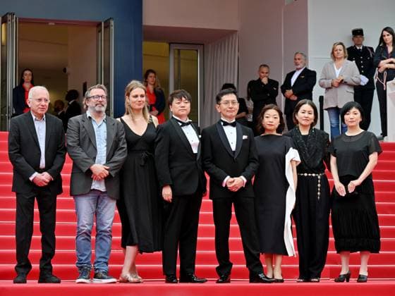 Cannes, 77th Cannes Film Festival 2024, Sixth evening - red carpet Palma d Or Studio Ghibli - In the photo: Vincent Maraval, Livia Van Der Staay, Kenichi Yoda, and Goro Miyazaki  Copyright: xManuelexMangiarottix xipa-agencyx xPoolxPhotoxEventsx03x IPA_Agency_IPA46310426