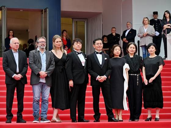 Cannes, 77th Cannes Film Festival 2024, Sixth evening - red carpet Palma d Or Studio Ghibli - In the photo: Vincent Maraval, Livia Van Der Staay, Kenichi Yoda, and Goro Miyazaki  Copyright: xManuelexMangiarottix xipa-agencyx xPoolxPhotoxEventsx03x IPA_Agency_IPA46310433