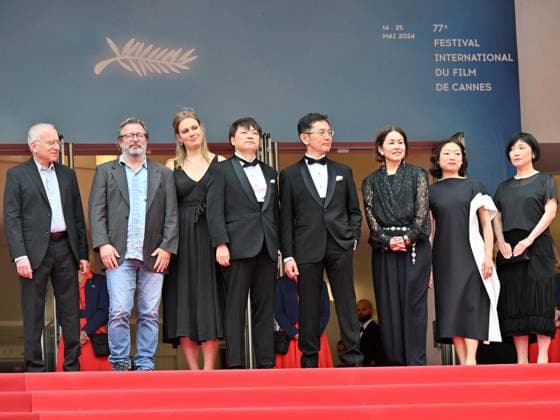 Cannes, 77th Cannes Film Festival 2024, Sixth evening - red carpet Palma d Or Studio Ghibli - In the photo: Vincent Maraval, Livia Van Der Staay, Kenichi Yoda, and Goro Miyazaki  Copyright: xManuelexMangiarottix xipa-agencyx xPoolxPhotoxEventsx03x IPA_Agency_IPA46310443