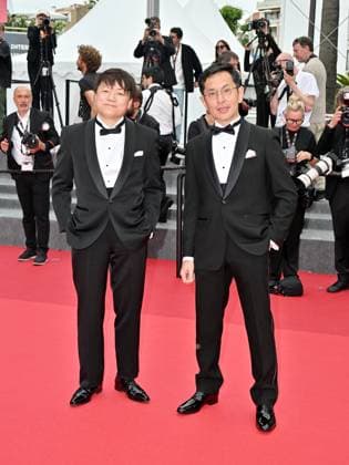 Cannes, France: Cannes, 77th Cannes Film Festival 2024, Sixth evening - red carpet Palma d Or Studio Ghibli - In the photo: Goro Miyazaki and Kenichi Yoda Cannes France  - ZUMAp169 20240520_zea_p169_636 Copyright: xManuelexMangiarottix