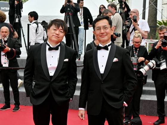 Cannes, France: Cannes, 77th Cannes Film Festival 2024, Sixth evening - red carpet Palma d Or Studio Ghibli - In the photo: Goro Miyazaki and Kenichi Yoda Cannes France  - ZUMAp169 20240520_zea_p169_638 Copyright: xManuelexMangiarottix