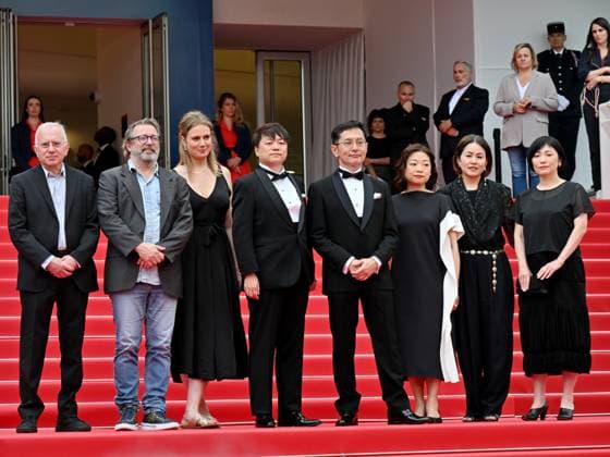 Cannes, France: Cannes, 77th Cannes Film Festival 2024, Sixth evening - red carpet Palma d Or Studio Ghibli - In the photo: Vincent Maraval, Livia Van Der Staay, Kenichi Yoda, and Goro Miyazaki Cannes France  - ZUMAp169 20240520_zea_p169_656 Copyright: xManuelexMangiarottix