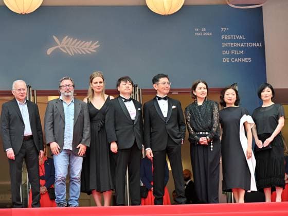 Cannes, France: Cannes, 77th Cannes Film Festival 2024, Sixth evening - red carpet Palma d Or Studio Ghibli - In the photo: Vincent Maraval, Livia Van Der Staay, Kenichi Yoda, and Goro Miyazaki Cannes France  - ZUMAp169 20240520_zea_p169_658 Copyright: xManuelexMangiarottix
