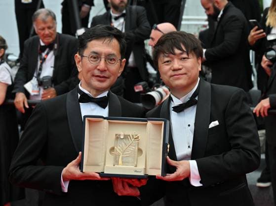 Cannes, France: Cannes, 77th Cannes Film Festival 2024, Seventh evening - red carpet Palma d Or Studio Ghibli - In the photo: Goro Miyazaki and Kenichi Yoda Cannes France  - ZUMAp169 20240520_zea_p169_668 Copyright: xManuelexMangiarottix