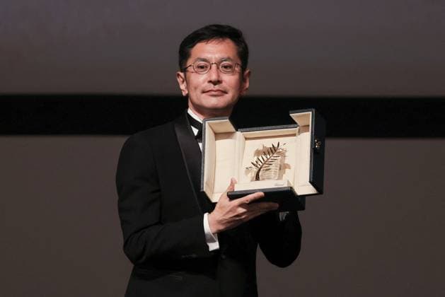 Cannes Palme D Or D Honneur To Studio Ghibli Ceremony DB Goro Miyazaki poses with the award during the ceremony for the Palme D Or D Honneur to Studio Ghibli at the 77th annual Cannes Film Festival at Palais des Festivals on May 20, 2024 in Cannes, France. Photo by David Boyer ABACAPRESS.COM Cannes France  Copyright: xBoyerxDavid ABACAx