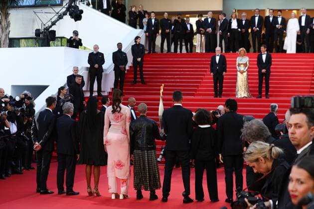 May 21, 2024, Cannes, Cote D azur, France: French athletes and PARIS 2024 President TONY ESTANGUET carry the Olympic torch up the red carpet ahead of Marcello Mio Premiere screening at the 77th Annual Cannes Film Festival at Palais des Festivals in Cannes, France Cannes France - ZUMAc179 20240521_zep_c179_097 Copyright: xMickaelxChavetx