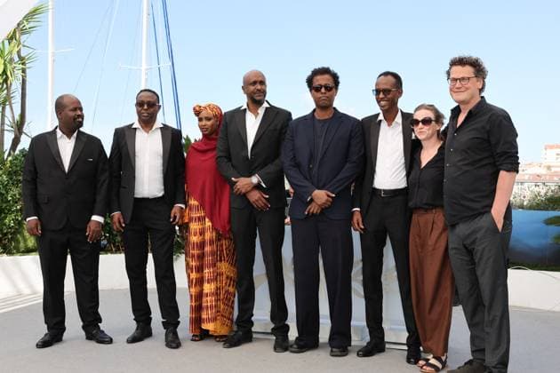 Cannes - The Village Next To Paradise Photocall Mohamed Jama, Abdimalik Yusuf, Anab Ahmed Ibrahim, Ahmed Farah, Mo Harawe, Ahmed Ali Farah, Sabine Moser and Oliver Neumann attend the The Village Next To Paradise Photocall at the 77th annual Cannes Film Festival at Palais des Festivals on May 22, 2024 in Cannes, France. Photo by Shootpix ABACAPRESS.COM Cannes France  Copyright: xShootpix ABACAx