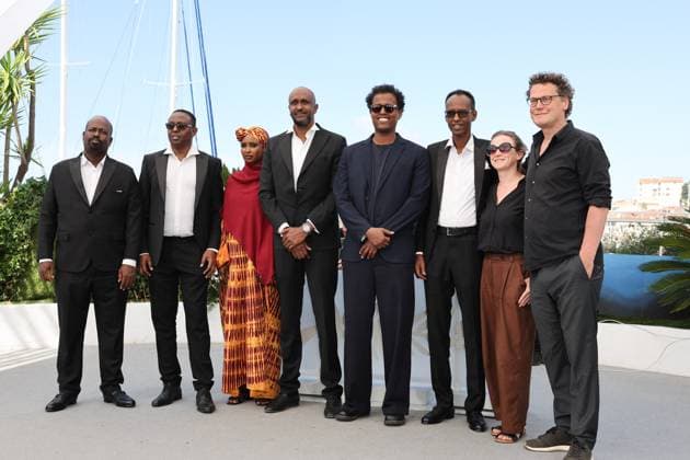 Cannes - The Village Next To Paradise Photocall Mohamed Jama, Abdimalik Yusuf, Anab Ahmed Ibrahim, Ahmed Farah, Mo Harawe, Ahmed Ali Farah, Sabine Moser and Oliver Neumann attend the The Village Next To Paradise Photocall at the 77th annual Cannes Film Festival at Palais des Festivals on May 22, 2024 in Cannes, France. Photo by Shootpix ABACAPRESS.COM Cannes France  Copyright: xShootpix ABACAx