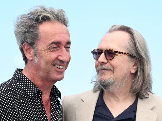 British actor Gary Oldman and Italian director Paolo Sorrentino attend the photo call for Parthenope at the 77th Cannes Film Festival in Cannes, France on Wednesday, May 22, 2024.  CAN20240522105 RUNExHELLESTAD