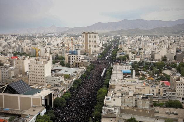 News Themen der Woche KW21 May 23, 2024, Mashhad, Razavi Khorasan, Iran: Iranians mourn during the late Iranian President Ebrahim Raisi and his companions, who were killed in a helicopter crash, funeral ceremony in Mashhad. Iran on Thursday prepared to inter its late president at the holiest site for Shiite Muslims in the Islamic Republic, a final sign of respect for a proto go of Iran s supreme leader killed in a helicopter crash earlier this week. Mashhad Iran - ZUMAi98_ 20240523_zih_i98_013 Copyright: xIranianxPresidencyx