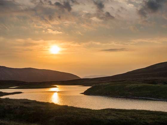 UK, Scotland, Lake in Cairngorm Mountains at sunrise, HUSF00352