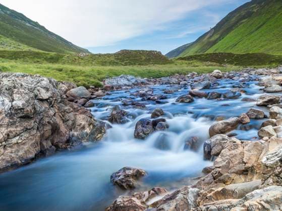 UK, Scotland, Long exposure of river Tilt flowing in Cairngorm Mountains, HUSF00361