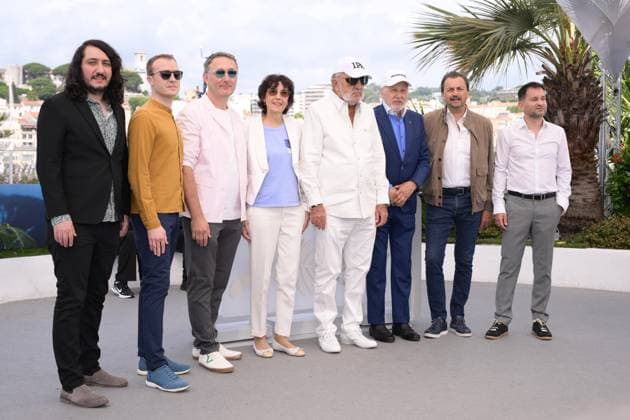 CANNES, FRANCE MAY 24 G D Tudor D POPESCU, co-director, Tudor GIURGIU, co-director, Cristian PASCARIU, co-director, Virginia RUZICI, former tennis player, protagonist, Ion TIRIAC, former tennis player, protagonist, Ilie NASTASE, former tennis player, protagonist, Henri LECONTE, former tennis player, protagonist, Cosmin HODOR, producer, during the photocall of the film Nasty More than just tennis in Seapnce Spà ciale at the 77th Cannes Film Festival at the Palais des Festivals on May 24, 2024 in Cannes, France CINEMA 77eme Festival de Cannes Photocall 24 05 2024 ValentinaClaret Panoramic