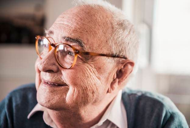 Creative Highlights Symbolbilder Thoughtful retired senior man wearing eyeglasses at home model released, Symbolfoto property released, UUF31640