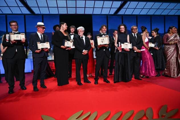 77eme Festival International du Film de Cannes Ceremonie de cloture 77th International Cannes Film Festival Closing ceremony 305533 2024 05 25 Cannes France Lucas, George Baker, Sean Audiard, Jacques Gascon, Karla Sofia Gerwig, Greta Fargeat, Coralie Pakadia, Payal Gomes, Miguel  Copyright: xSergexArnalx xStarfacex STAR_305533_025