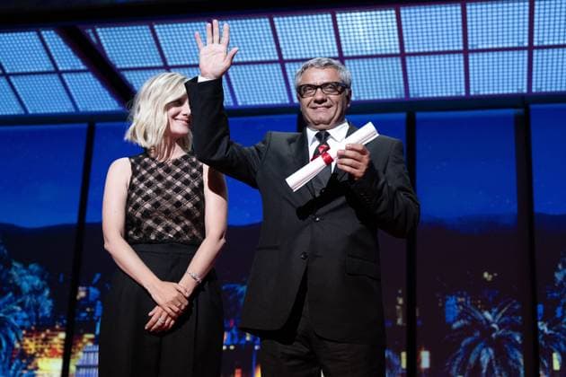 Annual Cannes Film Festival - Closing Ceremony - Cannes DN Mohammad Rasoulof receives the Special Award for Best Screenplay for The Seed of the Sacred Fig presented by MÃ lanie Laurent during the Closing Ceremony at the 77th annual Cannes Film Festival at Palais des Festivals on May 25, 2024 in Cannes, France. Photo by David NIVIERE ABACAPRESS.COM CANNES France  Copyright: xNivierexDavid ABACAPRESS.COMx