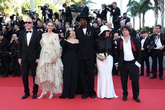 Cannes - Closing Ceremony Arrivals Members of the Camera d Or jury French deputy general manager HR and support TSF cinema Pascal Buron, Belgian director, screenwriter Zoe Wittock, French actress, director, producer and President of the Camera d Or jury Emmanuelle Beart, Congolese and Belgian director, songwriter, artistic director and President of the Camera d Or jury Baloji, French cinema section head ebra, treasurer sfcc Nathalie Chifflet and French director of photography Gilles Porte arrive for the Closing Ceremony of the 77th edition of the Cannes Film Festival in Cannes, southern France, on May 25, 2024. Photo by Shootpix ABACAPRESS.COM Cannes France Copyright: xShootpix ABACAx