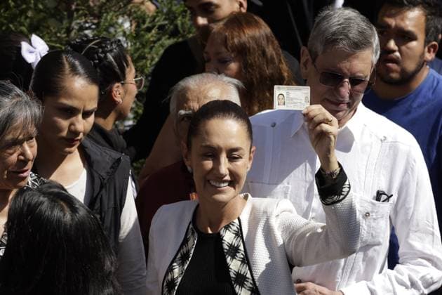Claudia Sheinbaum Pardo, candidate for the Presidency of Mexico by Sigamos Haciendo Historia coalition shows her Voting card before casting their vote during the general election. on June 2, 2024 in Mexico City, Mexico. Mexico City Mexico - ZUMAe321 20240602_zia_e321_037 Copyright: xLuisxBarronx