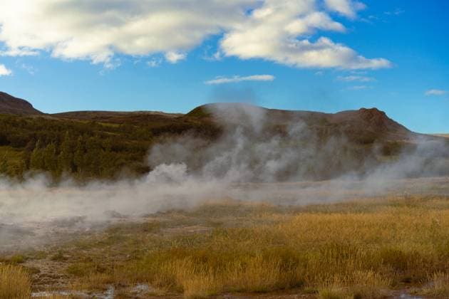 Creative Highlights World Smoke erupting from geyser against sky at Iceland. Selfoss, Iceland R_YUKI240529-1437232-01