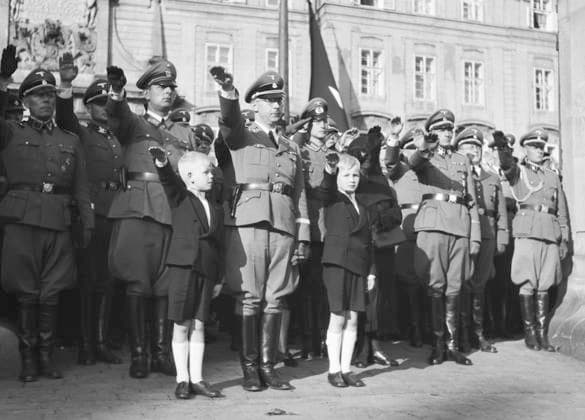 ***JUNE 7, 1942 FILE PHOTO***Heinrich Himmler, Reichsfuhrer of the SS, center, and sons of Heydrich Klaus, right, and Heider, left, during the funeral of Reinhard Heydrich, Deputy Reich Protector of the Protectorate of Bohemia and Moravia, in Prague, Protectorate of Bohemia and Moravia, June 7, 1942. Heydrich s coffin was placed on a train to Berlin, where a second ceremony was held on 9 June, 1942. (CTKxPhoto ) CTKPhotoF201008130180701  CTKPhotoF201008130180701