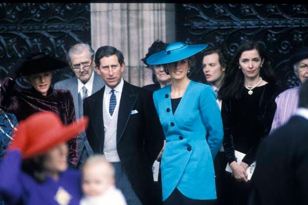 At the society wedding of Miss Camilla Dunne To The Honourable Rupert Soames HRH THE PRINCE OF WALES & HRH THE PRINCESS OF WALES & CATHERINE WALKER - PRINCE CHARLES & PRINCESS DIANA.At the society wedding of Miss Camilla Dunne To The Honourable Rupert Soames, Hereford Cathedral,.England, October 8th 1988..The princess is wearing an outfit designed by Catherine Walker..Lady Di royal half length blue turquoise teal hat suit jacket black buttons married husband wife.Ref: CAP PL. Phil Loftus Hereford Great Britain Copyright: xPhilxLoftus CapitalxPicturesx