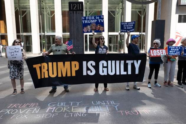 Bilder des Jahres 2024, News 06 Juni News Themen der Woche KW23 News Bilder des Tages June 4, 2024, New York, New York, USA: Protesters with the activist group Rise & Resist chant holding signs and banners outside of Fox News Channel demonstrating against the networkÃ¢â‚¬â ¢s Ã¢â‚¬oerigged trialÃ¢â‚¬Â coverage of the Trump hush money case and verdict which found former President Trump guilty on 34 counts. A banner reads TRUMP IS GUILTY. Signs read FOX IS TRUMP TV LOSER. Chalking on the plaza reads TRUMP: GUILTY UNTIL PROVEN MORE GUILTY. WHEN WILL FOX STOP LYING FOR TRUMP? Demonstrators come to Fox News headquarters weekly for a Truth Tuesdays protest. New York USA - ZUMAr174 20240604_znp_r174_003 Copyright: xGinaxMxRandazzox