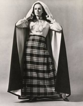 RECORD DATE NOT STATED The Scotch House fashions modelled by Joanna Lumley A Go Gay Ensemble from The Scotch House modelled by Joanna Lumley, consisting of a long, black velour cape trimmed with fur teamed with a Saxony long kilt skirt in Menzies tartan and traditional white blouse and jabot. Date: 1968  Copyright: Copyrightx(c)Geminix2023.xCredit:xGemini 13995596