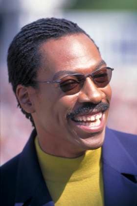 Stock pictures pre 1997 EDDIE MURPHY.pre 1997.headshot portrait yellow blue smiling moustache mustache facial hair sunglasses shades.CAP PL. Phil Loftus . London Great Britain Copyright: xPhilxLoftus CapitalxPicturesx