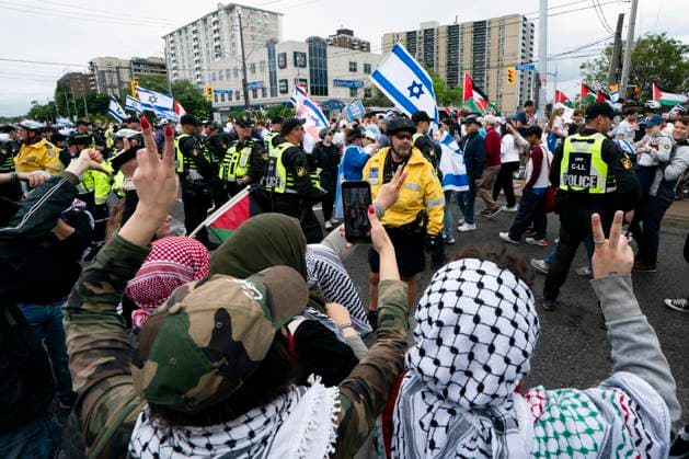 June 9, 2024, Toronto, On, Canada: Pro-Palestinian protesters gather along the route of the United Jewish AppealöÄÃ s annual Walk With Israel march in Toronto, on Sunday, June 9, 2024. Toronto Canada  - ZUMAc35_ 20240609_zaf_c35_015 Copyright: xArlynxMcadoreyx