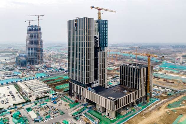 Creative Highlights World Sinochem 001 Building Construction in Xiong an A photo taken on May 4, 2024, is showing the Sinochem 001 building, the headquarters of Sinochem Holdings Co., LTD., under construction in the start-up area of Xiong an New Area in Hebei province, China. Xiong an Hebei China  Copyright: xCFOTOx originalFilename: cfoto-sinochem240611_npE6t.jpg