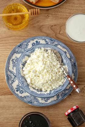 cottage cheese in a plate on the table R_KUAL24061193-1456627-01 EDITORIAL USE ONLY