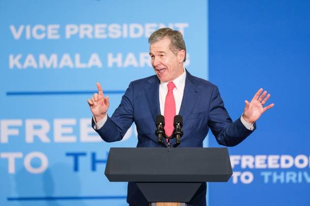 June 12, 2024, Charlotte, North Carolina, USA: North Carolina Governor ROY COOPER waves his hands in the air delivering remarks on stage at Johnson C. Smith University before Vice President Kamala Harris..Vice President Harris visits Charlotte, North Carolina on her economic opportunity tour leading up to the 2024 Presidential election. Charlotte USA - ZUMAv134 20240612_zsp_v134_016_20240612 Copyright: xMaxwellxVittoriox