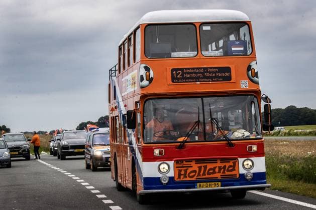EMMEN - Orange supporters drive in an orange-colored caravan from football club HHC Hardenberg to Hamburg, Germany. The KNVB organized a fan parade with the hope that as many Orange fans as possible will set sail in a caravan to Hamburg where the Dutch national team will play the first match of the European Championship against Poland. ANP VINCENT JANNINK netherlands out - belgium out  Copyright: xx x501063990x originalFilename: 501063990.jpg