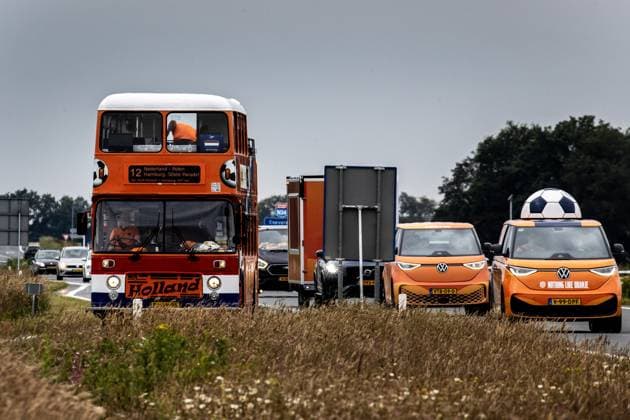 EMMEN - Orange supporters drive in an orange-colored caravan from football club HHC Hardenberg to Hamburg, Germany. The KNVB organized a fan parade with the hope that as many Orange fans as possible will set sail in a caravan to Hamburg where the Dutch national team will play the first match of the European Championship against Poland. ANP VINCENT JANNINK netherlands out - belgium out  Copyright: xx x501064116x originalFilename: 501064116.jpg