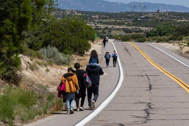JACUMBA HOT SPRINGS, CA - JUNE 14: Migrants cross into the U.S. from Mexico on June 14, 2024 in Jacumba Hot Springs, California. U.S. President Joe Biden on June 4 unveiled immigration order severely limiting asylum-seeker crossings.  Copyright: xVCGx 111502142484