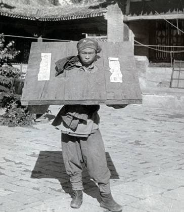 RECORD DATE NOT STATED Boxer rebel wearing a prisoner yoke during the The Boxer Rebellion Boxer rebel wearing a prisoner yoke during the The Boxer Rebellion, also known as the Boxer Uprising, an anti-foreign, anti-imperialist, and anti-Christian uprising in North China between 1899 and 1901, towards the end of the Qing dynasty.. Copyright: 917_05_wha_167_0849
