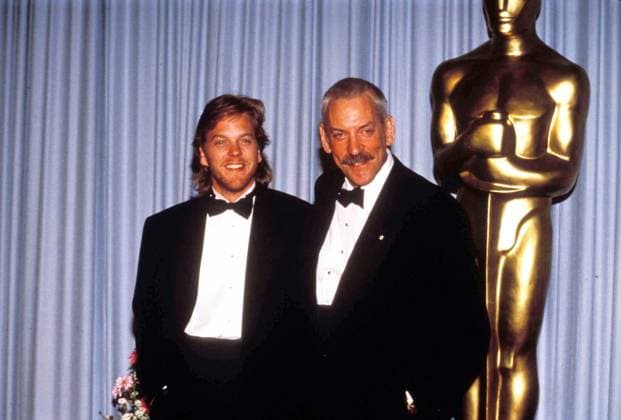Archivbilder der Woche KW25 **FILE PHOTO** Donald Sutherland Has Passed Away. Kiefer Sutherland And Donald Sutherland at the 61st Academy Awards on March 29, 1989, at the Shrine Auditorium in Los Angeles Copyright: xRalphxDominguez MediaPunchx