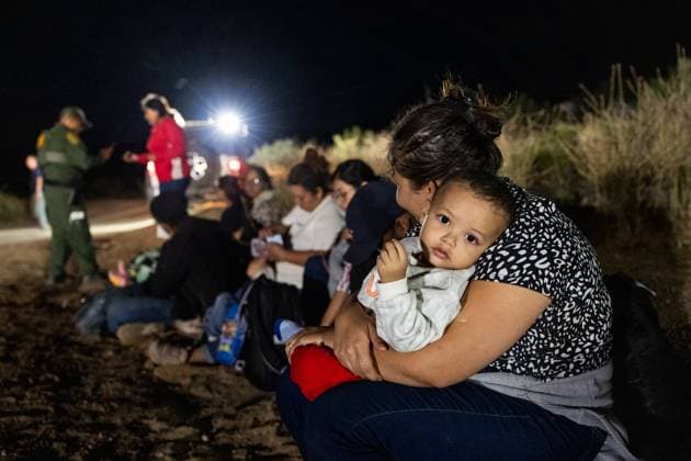 JACUMBA HOT SPRINGS, CA - JUNE 24: Migrants are processed by U.S. Border Patrol agents after crossing into U.S. from Mexico through an abandoned railroad on June 24, 2024 in Jacumba Hot Springs, San Diego, California.  Copyright: xVCGx 111503898899