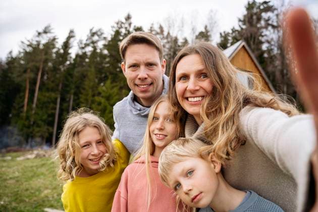 Happy family taking selfie together in back yard model released, Symbolfoto property released, NJAF01145