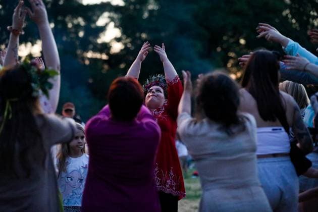 The Feast Under Wanda s Mound In Krakow People are dancing during The Feast under Wanda s Mound to celebrate the summer solstice in Krakow, Poland, on June 23, 2024. The feast under Wanda s Mound is being organized during the summer solstice, called Kupala Night. This holiday is referring to the traditions of the Slavs and their rituals, where herbs and flowers are playing an important role. During the event, participants are weaving wreaths, learning to weave wicker, watching a warrior duel, or baking food over a bonfire. Krakow Poland  Copyright: xKlaudiaxRadeckax originalFilename: radecka-thefeast240623_npuO3.jpg