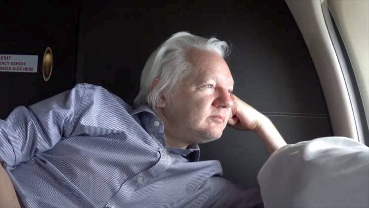 RECORD DATE NOT STATED 264818.jpg Wikileaks founder Julian Assange on a private jet on his way to transit in Bangkok on Tuesday June 25, 2024 as he is on the way to Saipan, where he in expected to plead guilty to violating U.S. espionage law, after reaching a deal with U.S. authorities to set him free after 1901 days in pre-trial detention and pleading for political asylum.June 24, 2024. Wikileaks said Assange was released on bail by the London High Court and taken to Stanstead Airport during the afternoon, where he boarded a plane and departed the UK after 1901 days in pre-trial detention and pleading for political asylum. Video shared online by Wikileaks appear to show Assange, dressed in jeans and a blue shirt, being driven to Stanstead before boarding an airc  Copyright: xx 264818 x eyepress124233