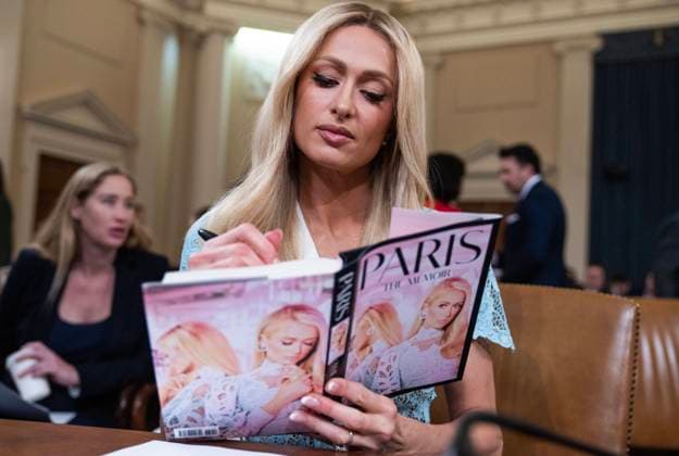 Bilder des Jahres 2024, Entertainment 06 Juni News Themen der Woche KW26 Entertainment Bilder des Tages Paris Hilton Ways and Means Committee UNITED STATES - JUNE 26: Paris Hilton, Lived-Experience Advocate and CEO 11:11 Media, signs a copy of her book during a break in the House Ways and Means Committee hearing on Strengthening Child Welfare and Protecting America™s Children, in Longworth building on Wednesday, June 26, 2024. (Tom Williams CQ Roll Call) Bethesda MD United States EDITORIAL USE ONLY Copyright: x2024xCQ-RollxCall,xInc.x TomxWilliamsx rollcallpix159652