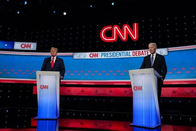 President Joe Biden and former president Donald Trump stand on the stage as CNN hosts an election debate in Atlanta, Georgia on Thursday, June 27, 2024. The debate will be held in CNN s Atlanta studios with Jake Tapper and Dana Bash as moderators.  ATL20240627208 ELIJAHxNOUVELAGE