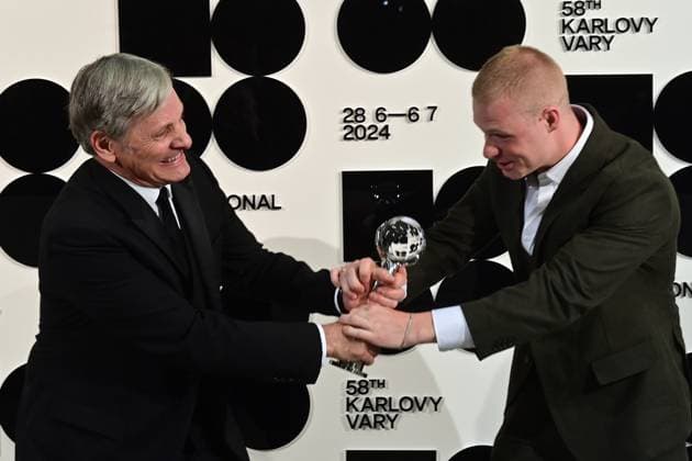 American actor Viggo Mortensen, left, received the President s Award during the opening ceremony of the 58th Karlovy Vary International Film Festival was held on June 28, 2024, in Karlovy Vary, Czech Republic. On the right side is seen British actor Solly McLeod. (CTKxPhoto SlavomirxKubes) CTKPhotoP2024062808379  CTKPhotoP2024062808379