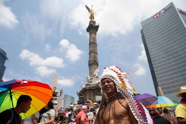 June 29, 2024, Mexico City, Mexico City, Mexico: Citizens attending the LGBT+ Pride March in Mexico City posing for a photo at the foot of the Angel de la Independencia. Mexico City Mexico - ZUMAs310 20240629_zip_s310_001 Copyright: xLuisxExSalgadox