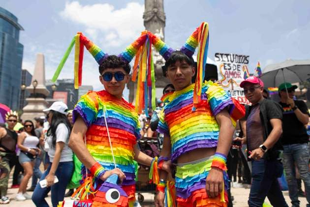 June 29, 2024, Mexico City, Mexico City, Mexico: Citizens attending the LGBT+ Pride March in Mexico City posing for a photo at the foot of the Angel de la Independencia. Mexico City Mexico - ZUMAs310 20240629_zip_s310_004 Copyright: xLuisxExSalgadox
