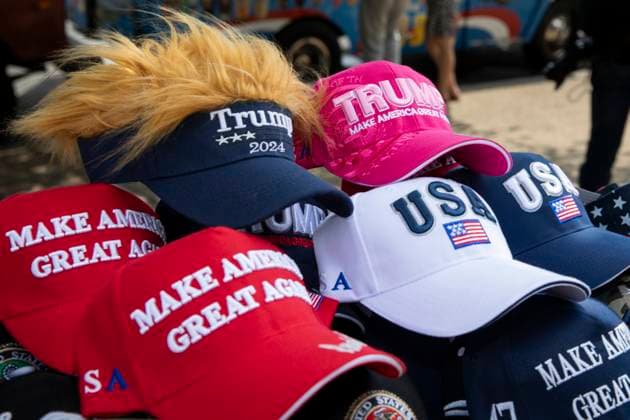 Washington DC: 2024 U.S. Presidential Election Campaign Clothing A street vendor is selling Make America Great Again hats and other pro-Trump merchandise in Washington DC, USA, on June 29, 2024. The 2024 United States presidential election is the 60th quadrennial presidential election, set to be held on November 5, 2024. Washington DC United States  Copyright: xAashishxKiphayetx originalFilename: kiphayet-washingt240629_nppUY.jpg
