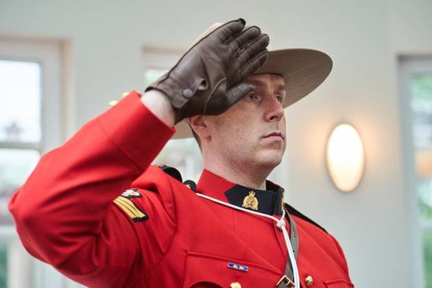 July 1, 2024, Winnipeg, Mb, Canada: Manitoba RCMP Sgt. Kristopher Kohalmi salutes during a Canada Day citizenship ceremony at the Assiniboine Park Pavilion in Winnipeg, Man., Monday July 1, 2024. Winnipeg Canada  - ZUMAc35_ 20240701_zaf_c35_055 Copyright: xDavidxLipnowskix