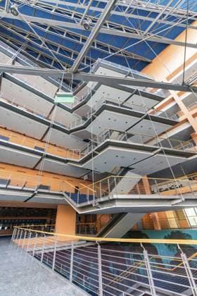 Creative Highlights World A modern office building with open spaces, glass facades and stairs, designed in bright colours, Berlin, Germany, Europe *** a Modern Office Building With Open spaces, Glass Facades and stairs, designed in Bright colors, Berlin, Germany, Europe Copyright: imageBROKER ManuelxKamuf iblmlk10809707.jpg
