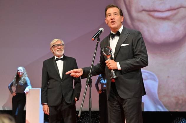 British actor Clive Owen received President s Award of Karlovy Vary International Film Festival from festival president Jiri Bartoska (left) at the closing awards ceremony of the 58th Karlovy Vary International Film Festival, in Karlovy Vary, Czech Republic, on July 6, 2024. (CTKxPhoto OndrejxHajek) CTKPhotoP2024070605316  CTKPhotoP2024070605316